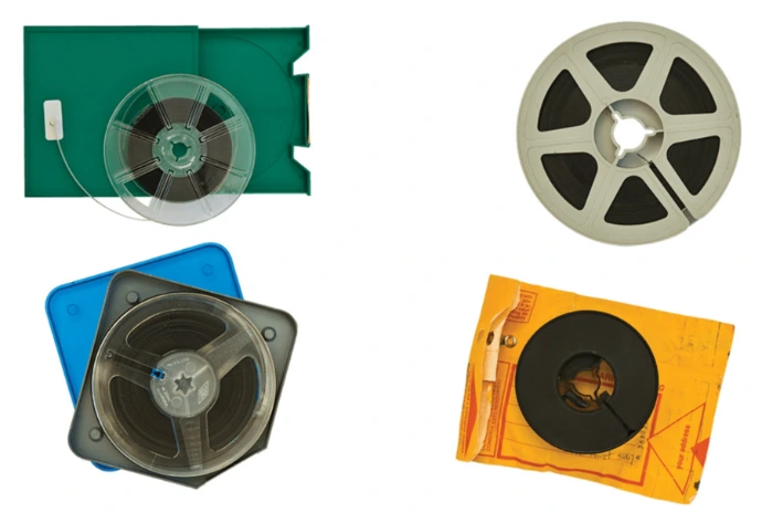 Old 8mm movie film reels being transferred to digital